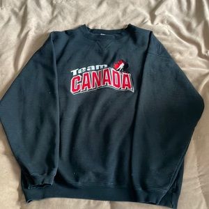 Black vintage puma team Canada hockey crewneck.